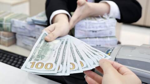 Tỷ giá chịu áp lực tăng, lãi suất huy động hạ nhiệt