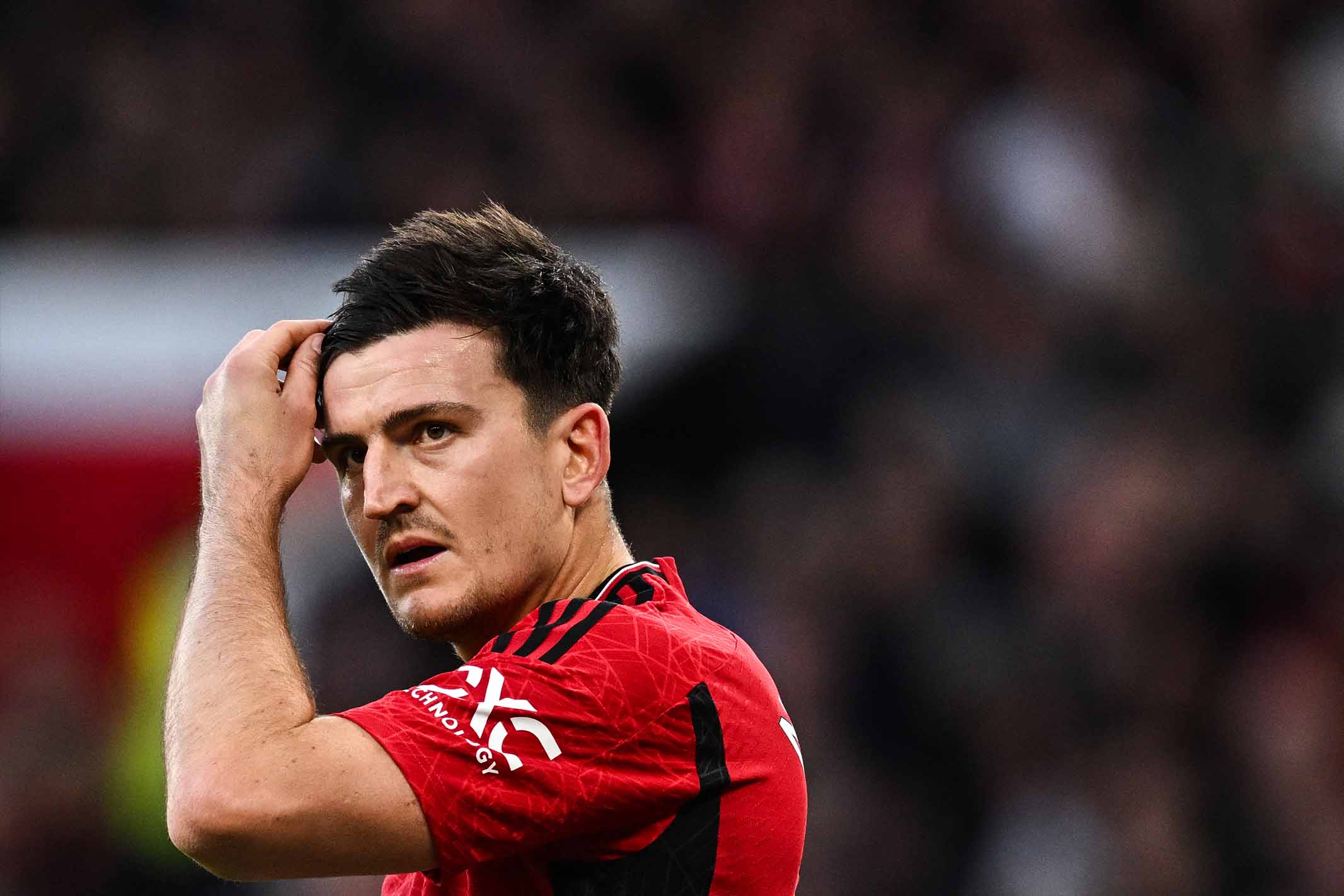 Harry Maguire đã đồng ý giảm lương nhưng còn tùy quyết định cuối cùng của ban lãnh đạo. Ảnh: AFP